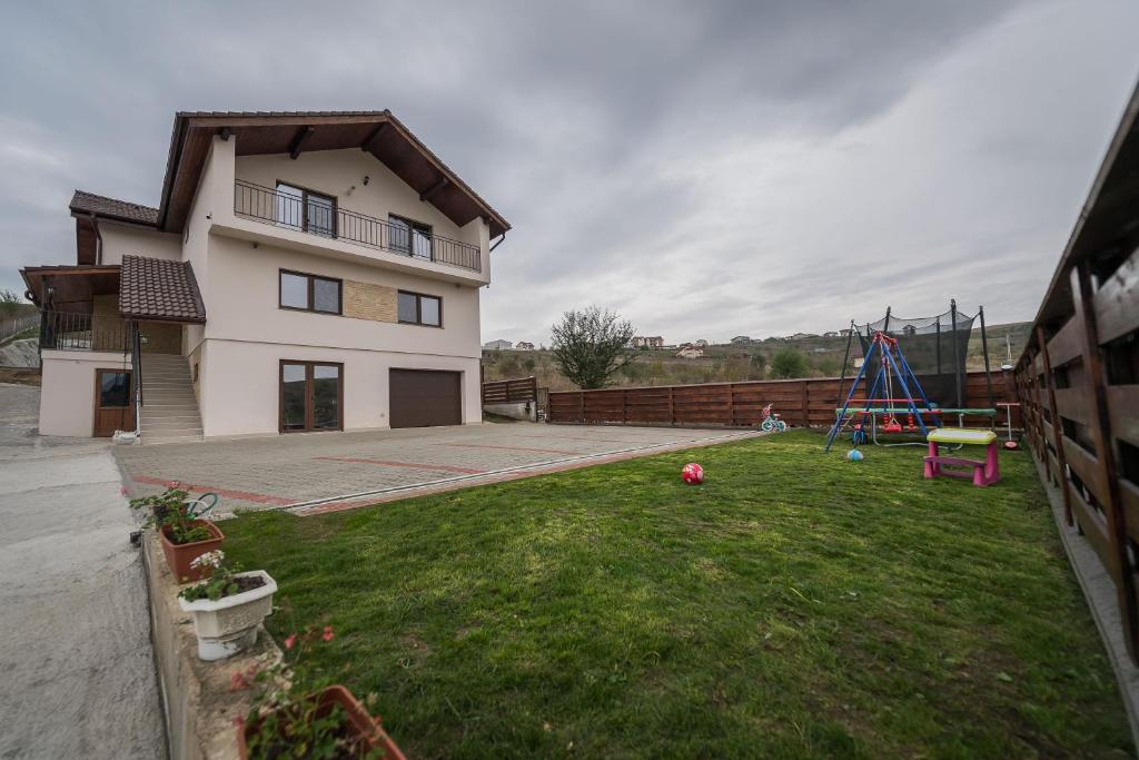 Herní místnost nebo prostor pro děti v ubytování Pensiunea Giulia Home