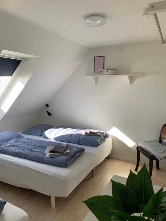 Krevet ili kreveti u jedinici u okviru objekta Pakhuset Anholt