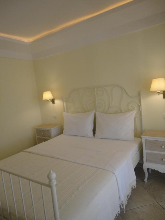 Postel nebo postele na pokoji v ubytování Guest House Sea Breeze