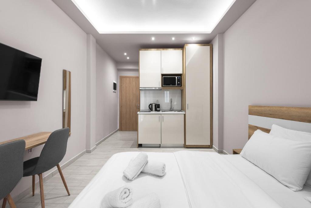 Łóżko lub łóżka w pokoju w obiekcie Lausanne, Nilie Hospitality MGMT
