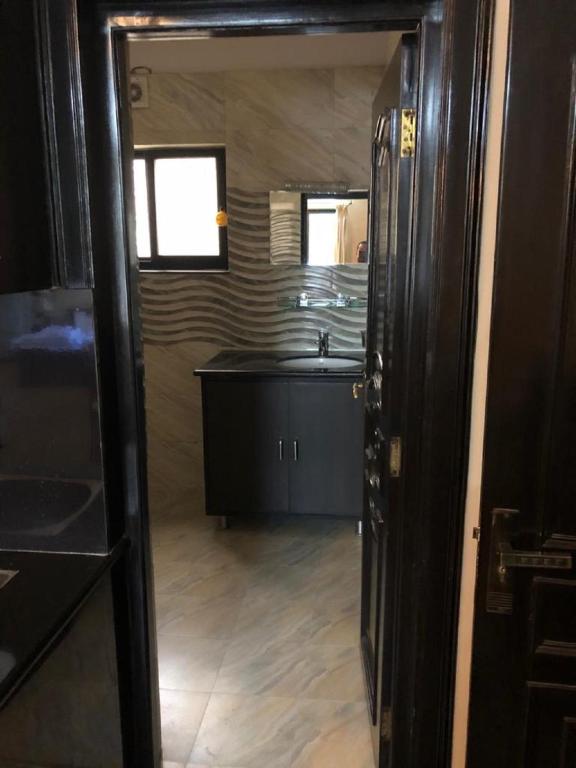 Kuchyň nebo kuchyňský kout v ubytování Rinchen Hotel