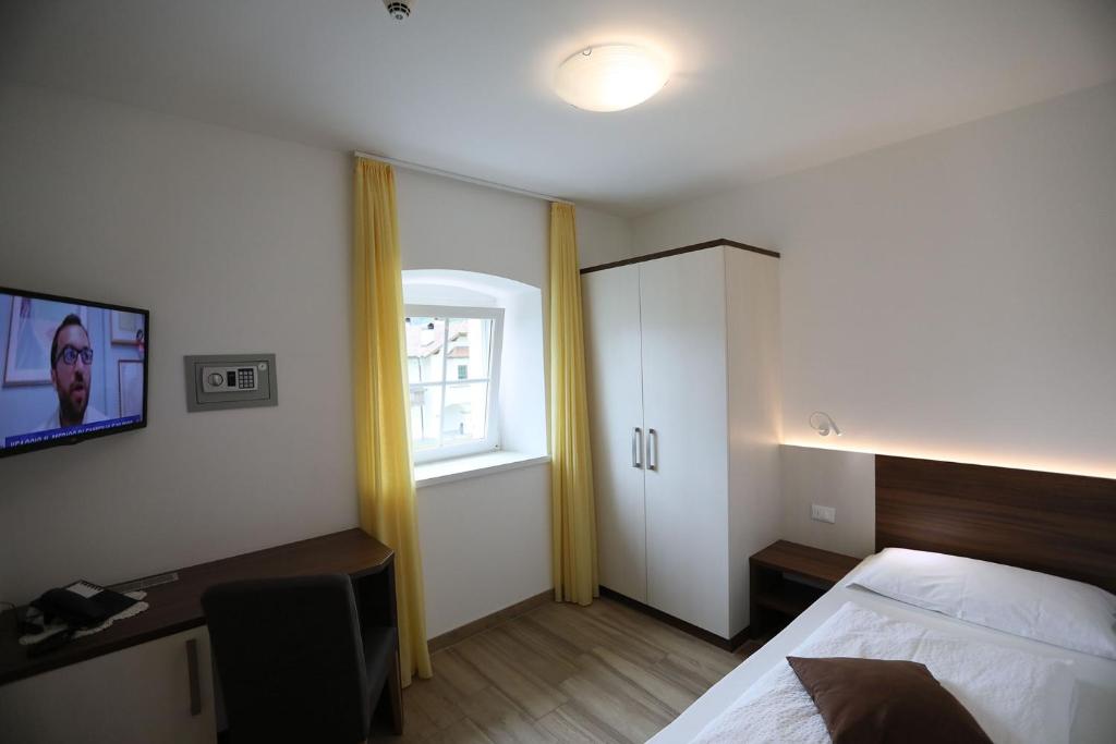 TV a/nebo společenská místnost v ubytování Hotel Stampfer B&B