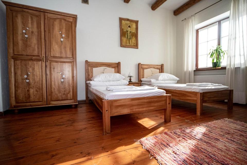 Postel nebo postele na pokoji v ubytování Żabie Oko