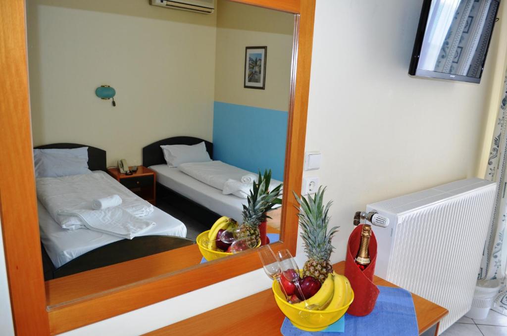 Postel nebo postele na pokoji v ubytování Hotel Europe Inn