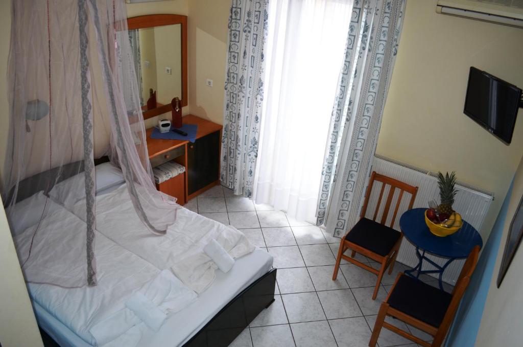 Postel nebo postele na pokoji v ubytování Hotel Europe Inn