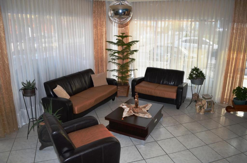 Posezení v ubytování Hotel Europe Inn