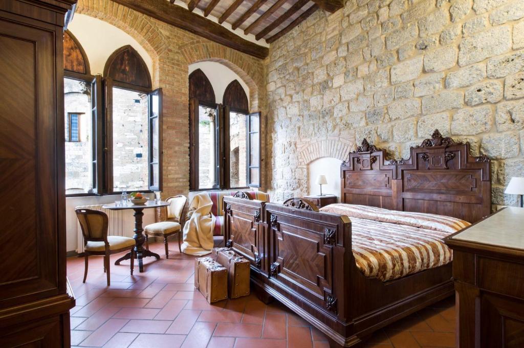 เตียงในห้องที่ B&B San Gimignano Diffuso