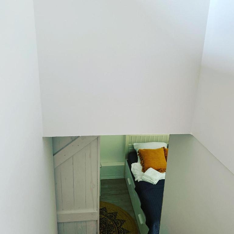 Postel nebo postele na pokoji v ubytování Ferienhaus No. 4