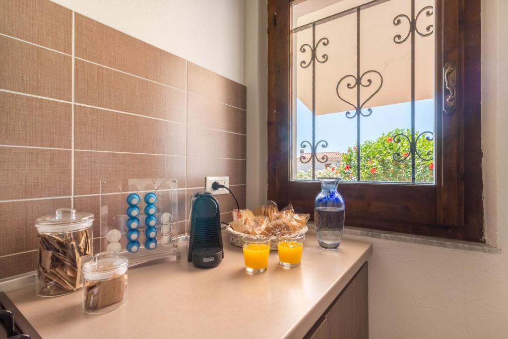 Napoje w obiekcie Casa Azzurra - Casa con giardino privato a Costa Rei a due passi dal mare