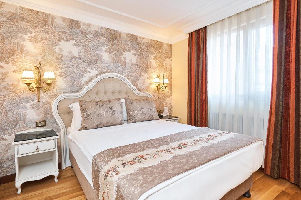 A bed or beds in a room at Best Western Empire Palace Hotel & Spa
