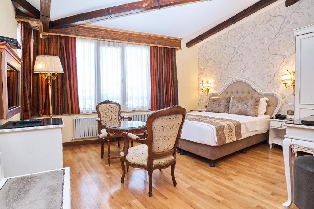 A bed or beds in a room at Best Western Empire Palace Hotel & Spa