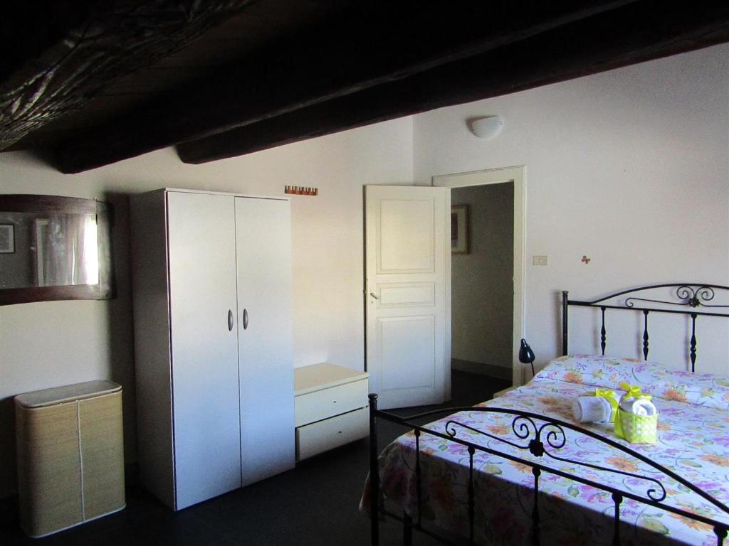 Postel nebo postele na pokoji v ubytování Bed & Breakfast StradaNuova