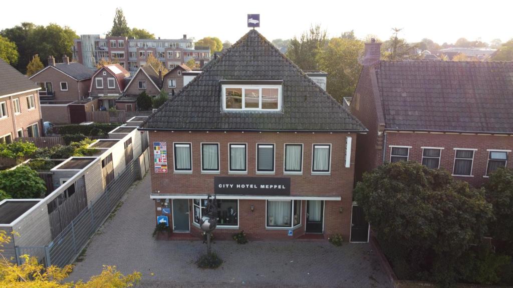 an aerial view of a building in a city at City Hotel Meppel in Meppel