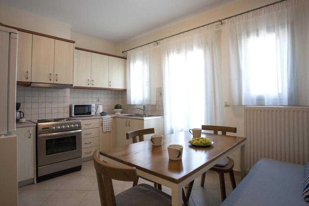 Kuchyň nebo kuchyňský kout v ubytování Santorini Med Homes - Sunday Apartment