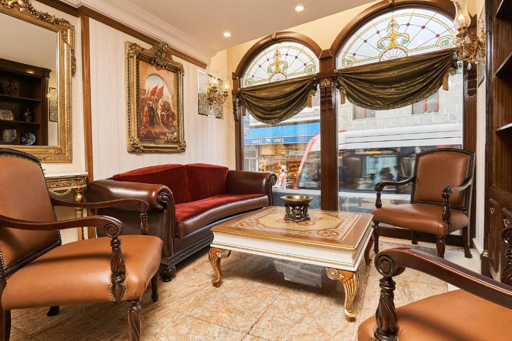 A seating area at Best Western Empire Palace Hotel & Spa