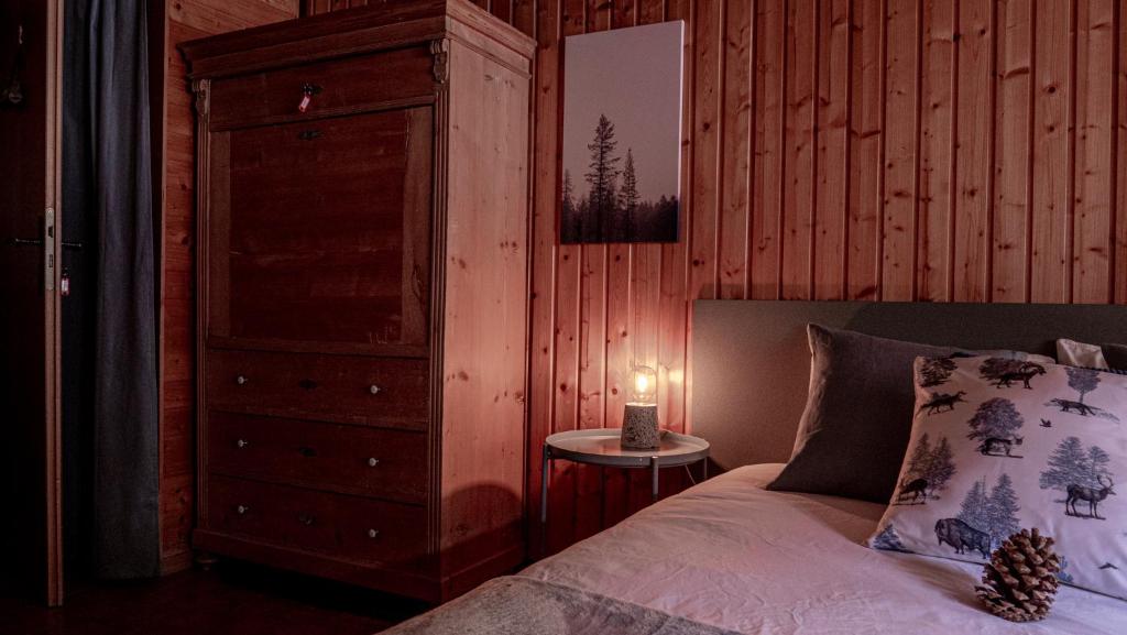 Postel nebo postele na pokoji v ubytování Relais des Mélèzes