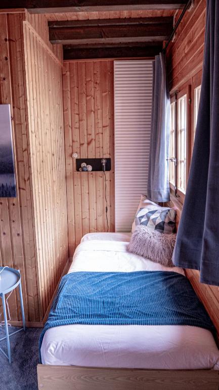Postel nebo postele na pokoji v ubytování Relais des Mélèzes