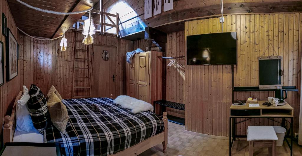 Postel nebo postele na pokoji v ubytování Relais des Mélèzes