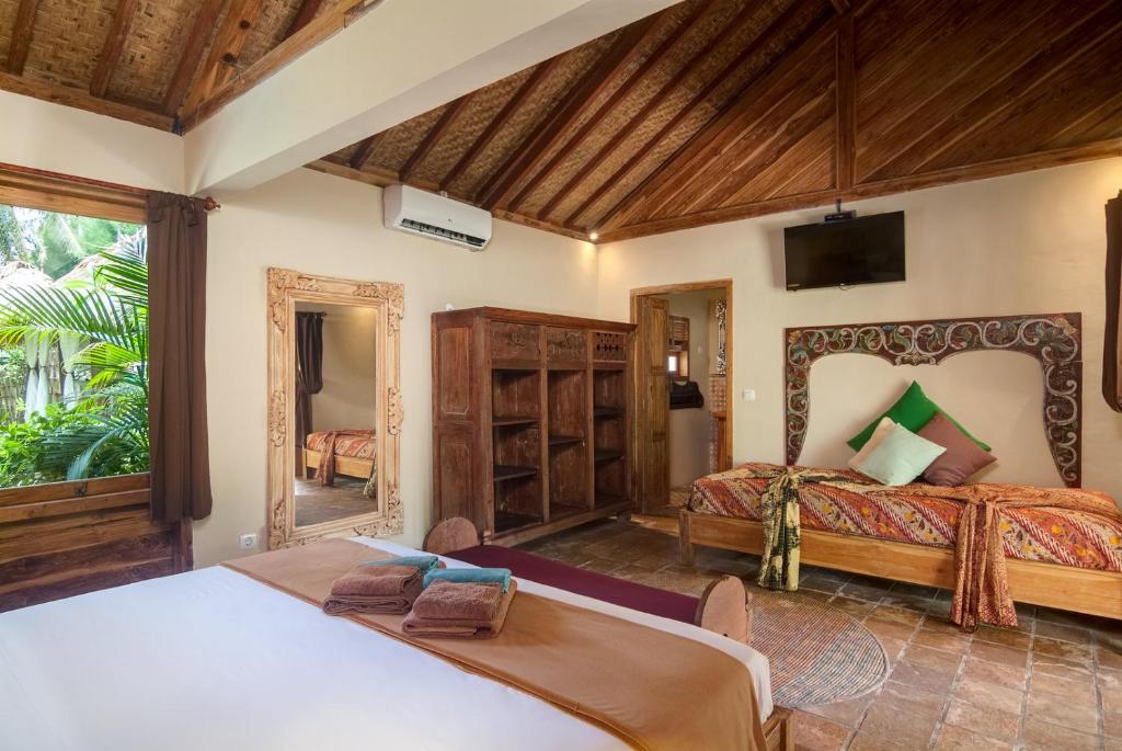 Voodi või voodid majutusasutuse Dolcemare Resort toas