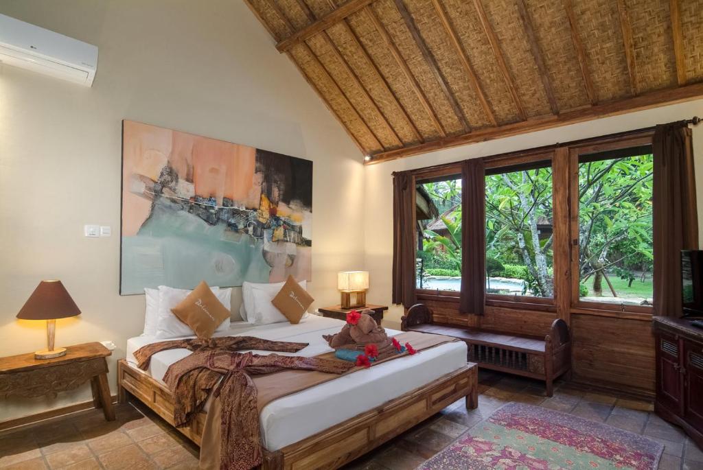 Voodi või voodid majutusasutuse Dolcemare Resort toas