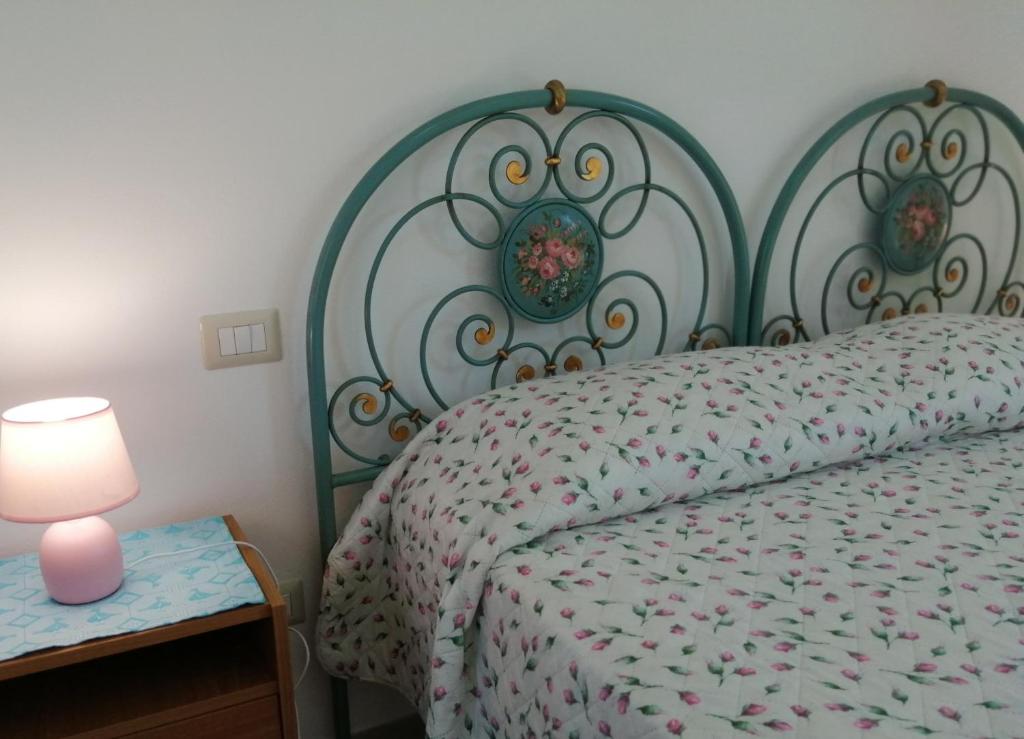 Postel nebo postele na pokoji v ubytování Istentales Alghero