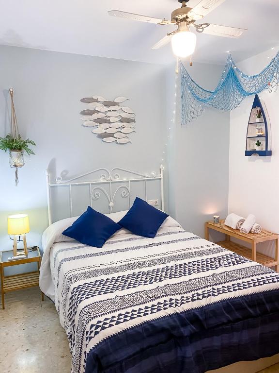 Posteľ alebo postele v izbe v ubytovaní Homely Málaga Goleta