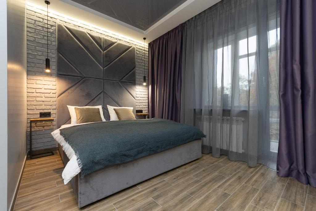 Postel nebo postele na pokoji v ubytování Tomas apartments