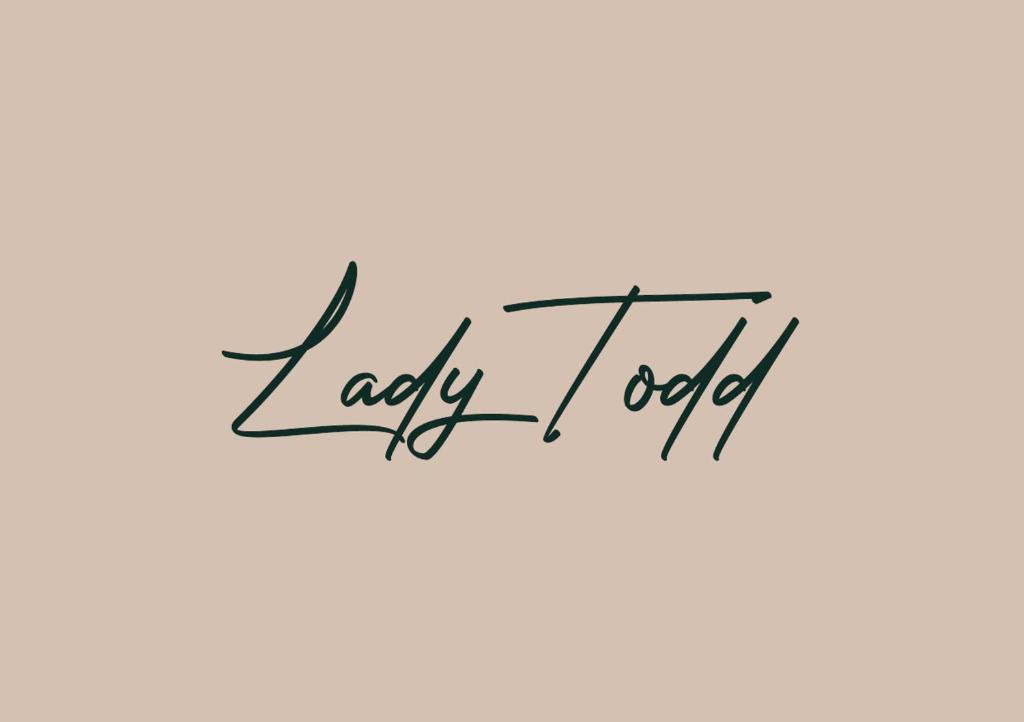 a handwritten inscription lady acid written in cursive fonts at Lady Todd in Sliema
