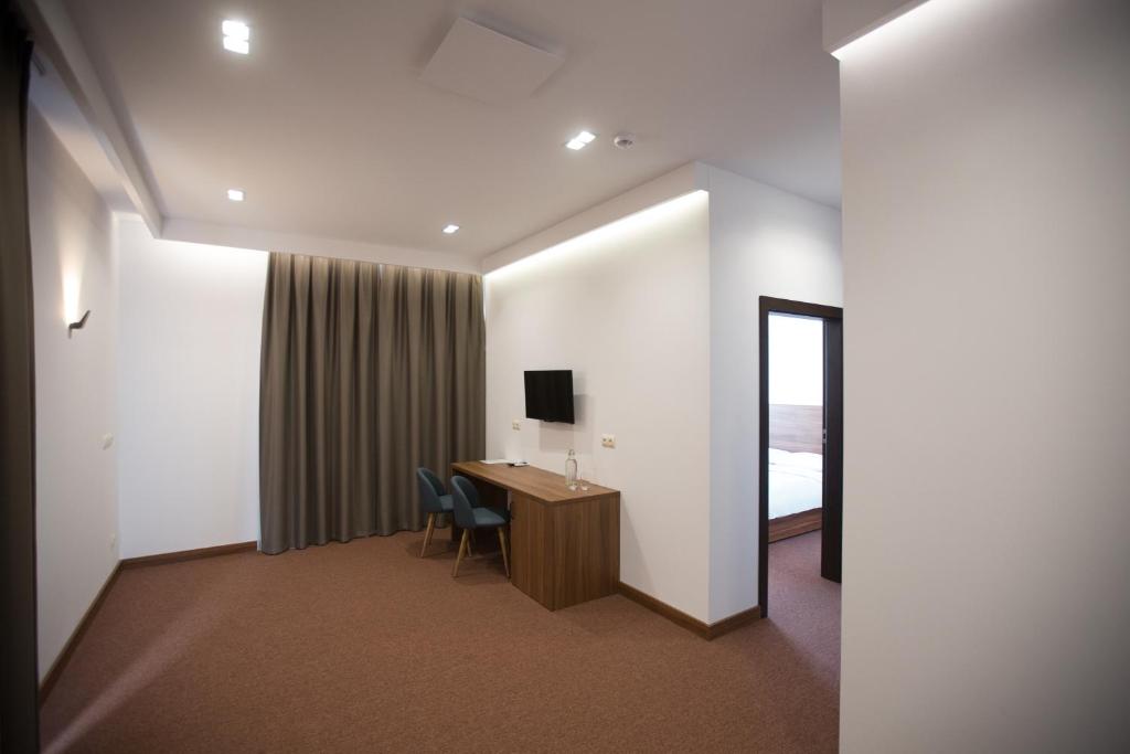 TV a/nebo společenská místnost v ubytování Hotel Rubin