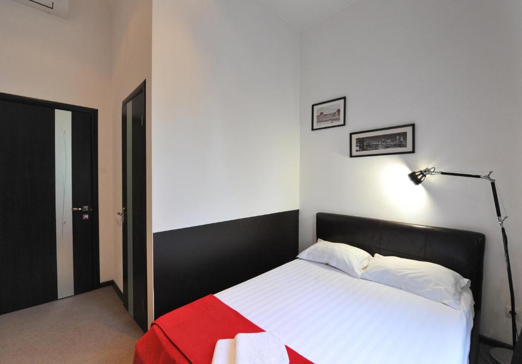 Postel nebo postele na pokoji v ubytování Reno Hotel