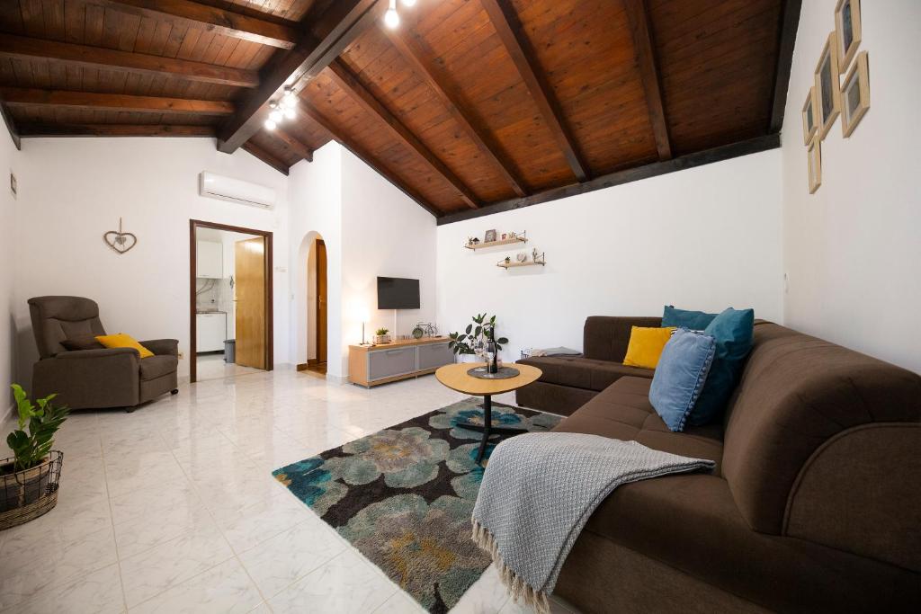 Posedenie v ubytovaní Maslina Apartman