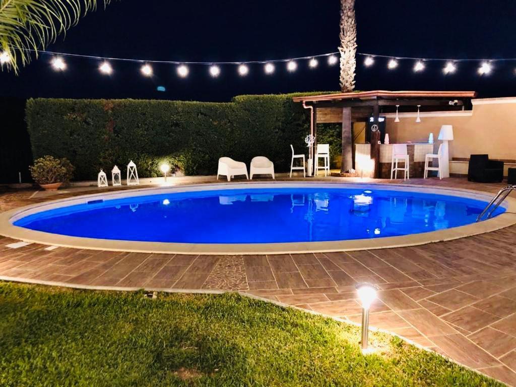 The swimming pool at or close to Villa Grisì