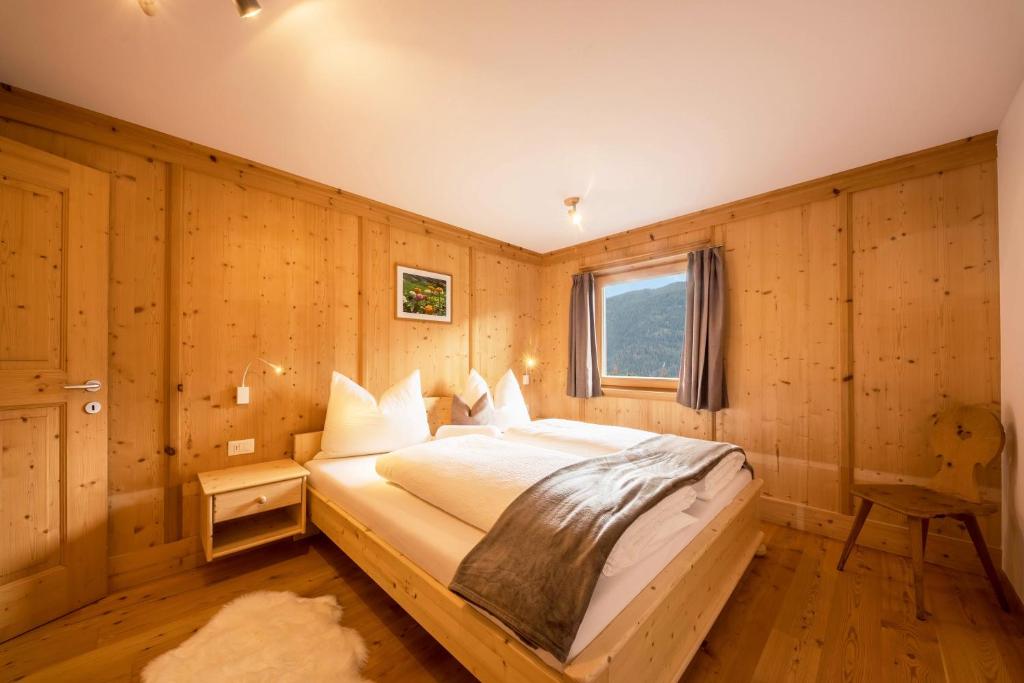 Łóżko lub łóżka w pokoju w obiekcie Panorama Apartment Raffeinhof