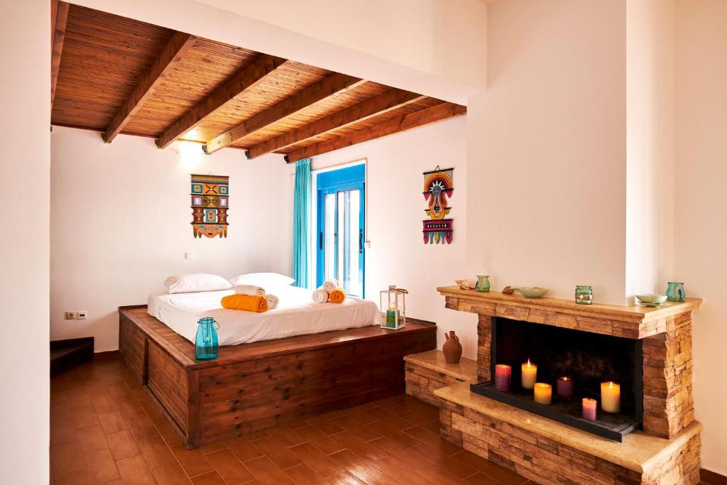 Postel nebo postele na pokoji v ubytování Nerida Beachfront Villas