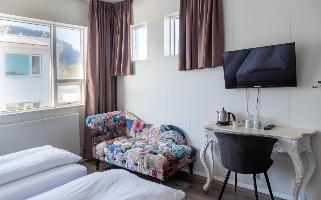 Postel nebo postele na pokoji v ubytování Guesthouse Hamar