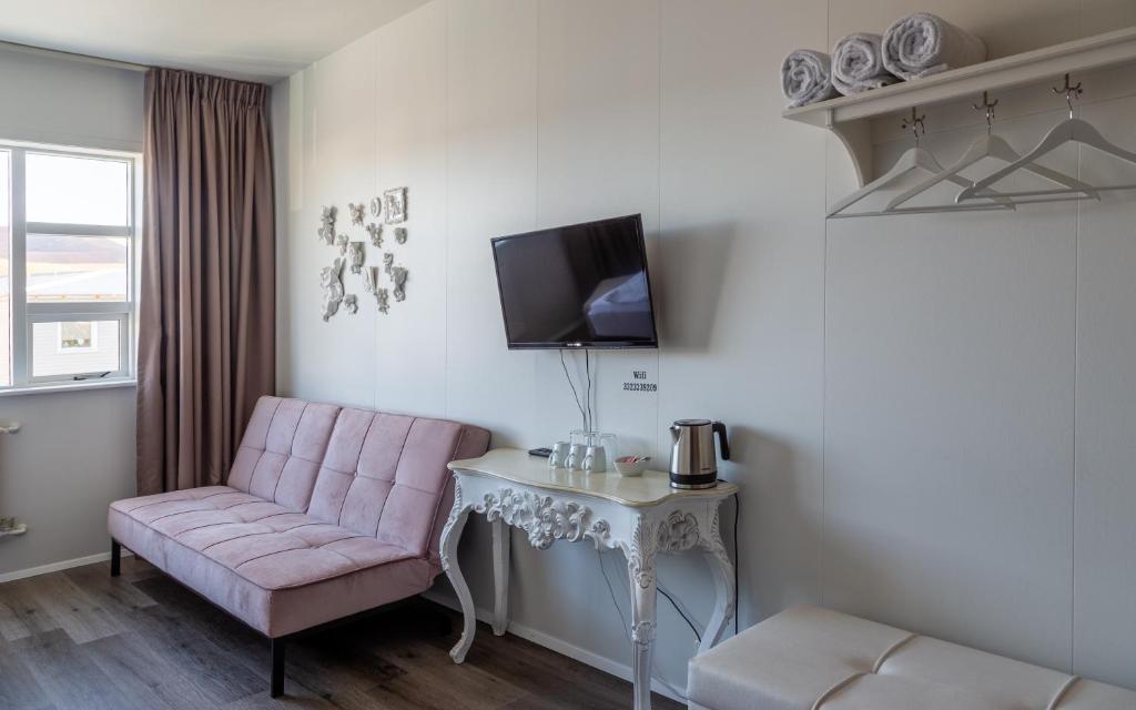 TV a/nebo společenská místnost v ubytování Guesthouse Hamar