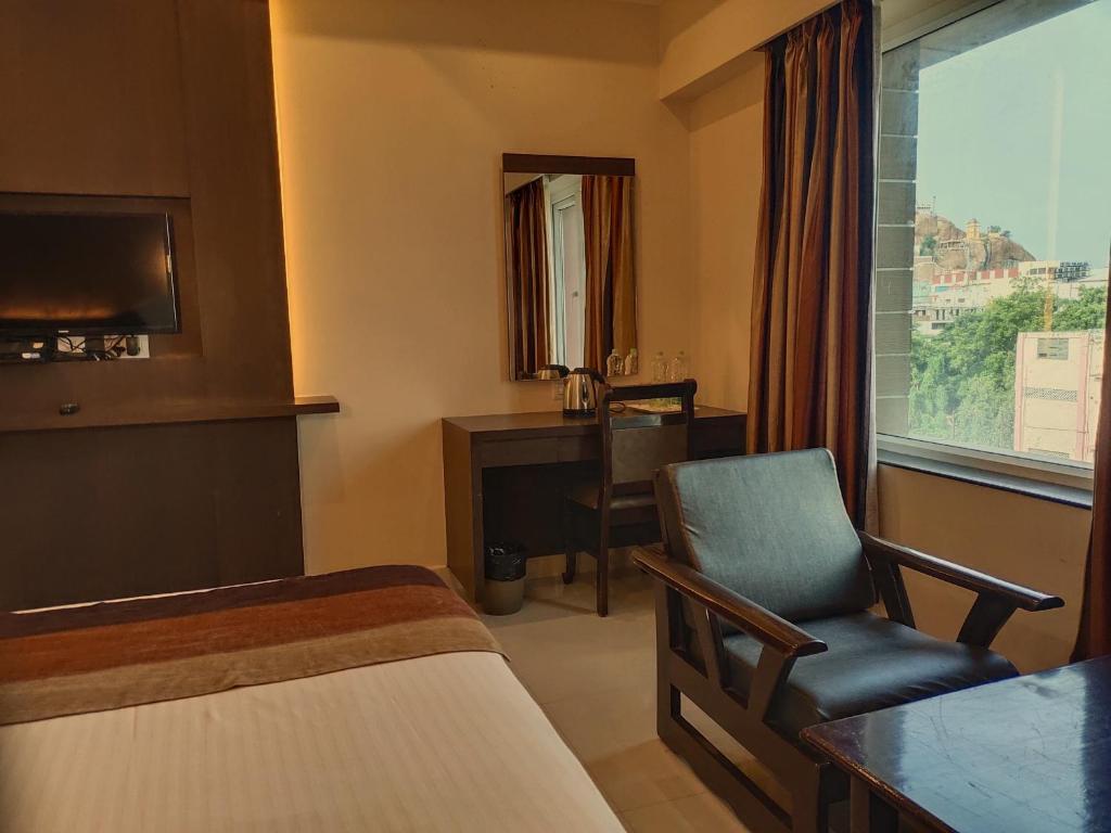 Postel nebo postele na pokoji v ubytování Hotel Deepam