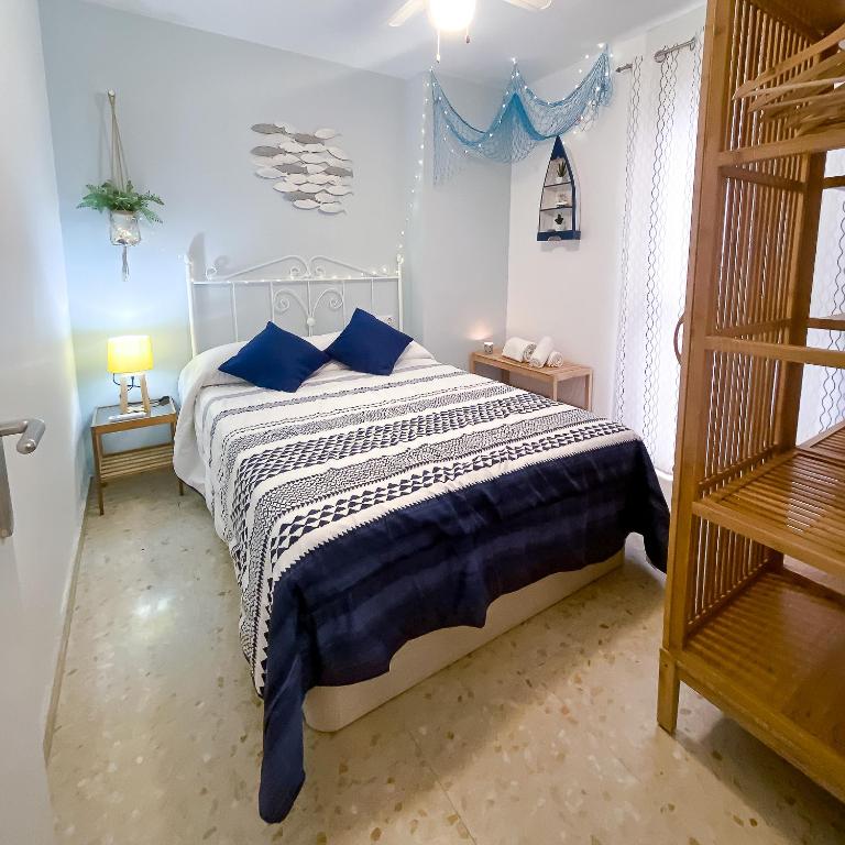 Posteľ alebo postele v izbe v ubytovaní Homely Málaga Goleta