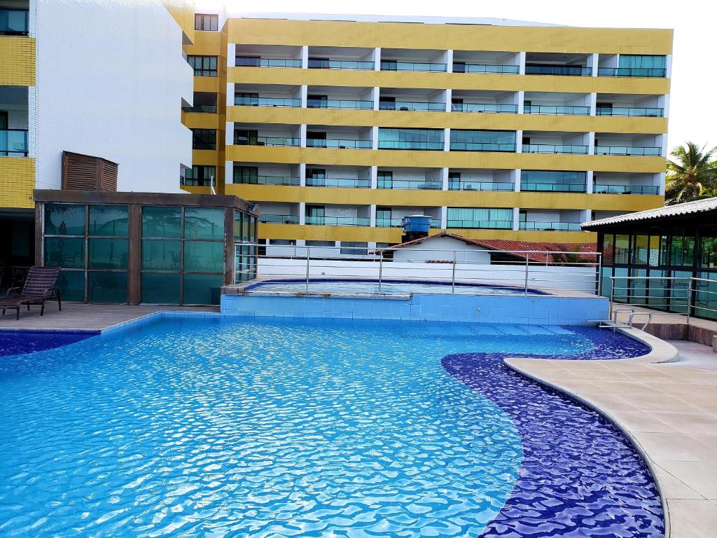 Bazén v ubytování Life Tabatinga Beach-Flat com Wi-Fi nebo v jeho okolí