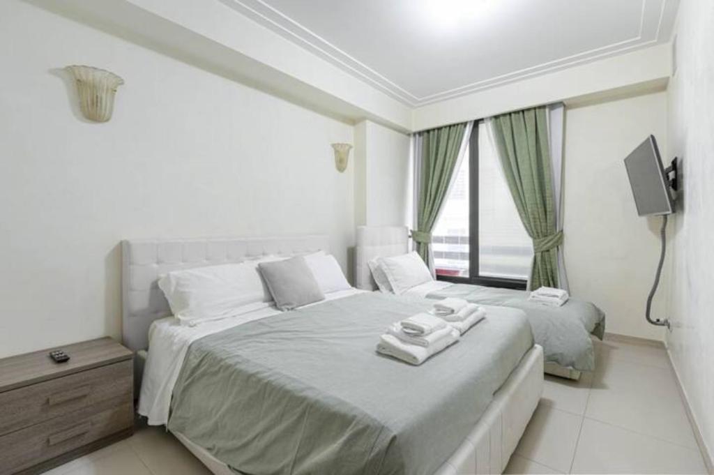 A bed or beds in a room at Visconti apartment.