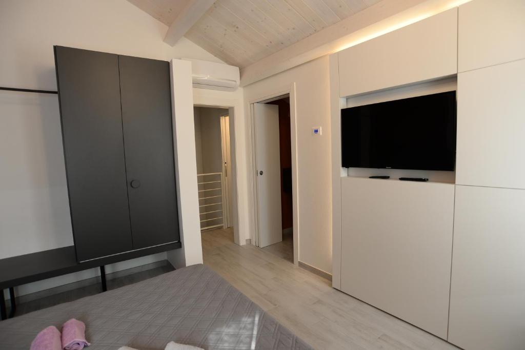 Telewizja i/lub zestaw kina domowego w obiekcie Altana Deluxe Apart