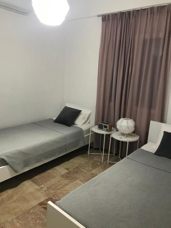 Postel nebo postele na pokoji v ubytování ISTRON BREEZE II