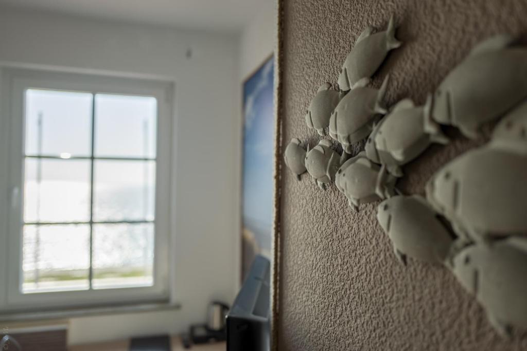 TV a/nebo společenská místnost v ubytování AKZENT Strandhotels Seestern, Delphin & Lachs