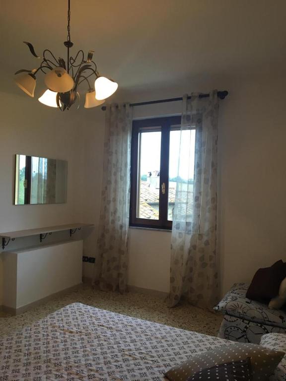 Posteľ alebo postele v izbe v ubytovaní La casina nel Borgo