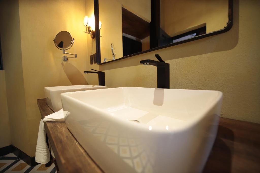 Koupelna v ubytování Antigua Trece Hotel Fusión