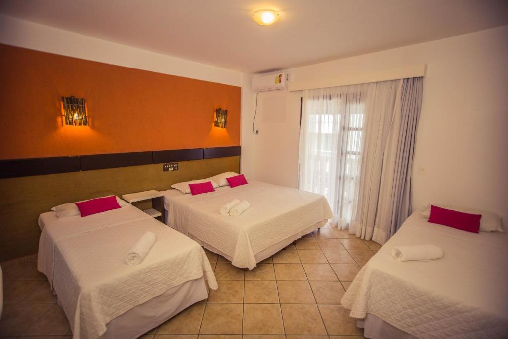 Cama ou camas em um quarto em Pousada Dom Capudi