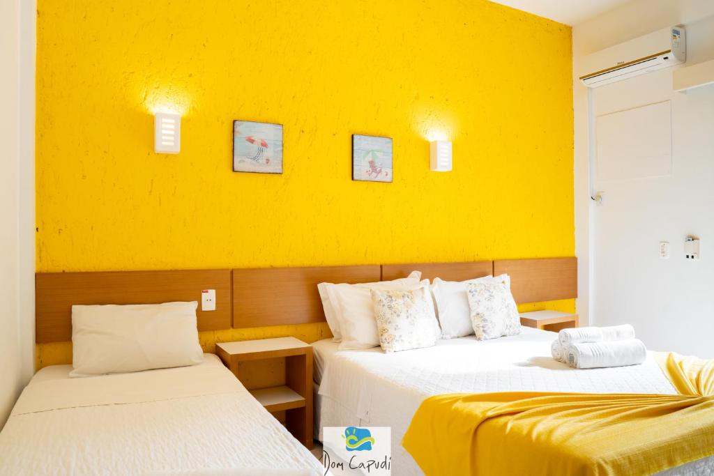 Cama ou camas em um quarto em Pousada Dom Capudi