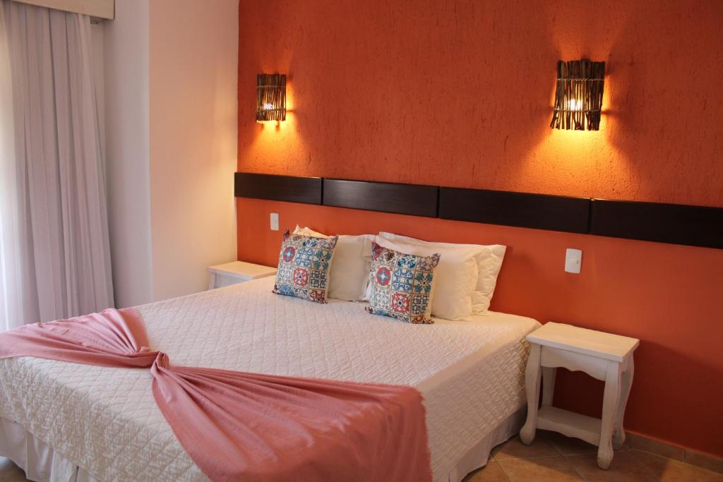 Cama ou camas em um quarto em Pousada Dom Capudi
