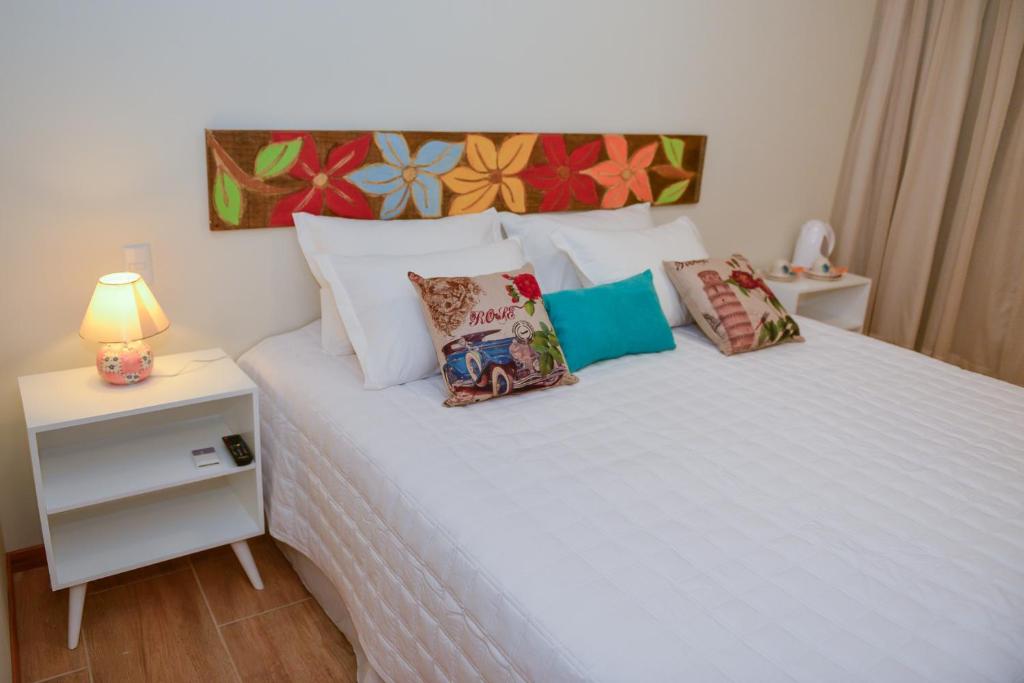 Cama ou camas em um quarto em Pousada Dom Capudi