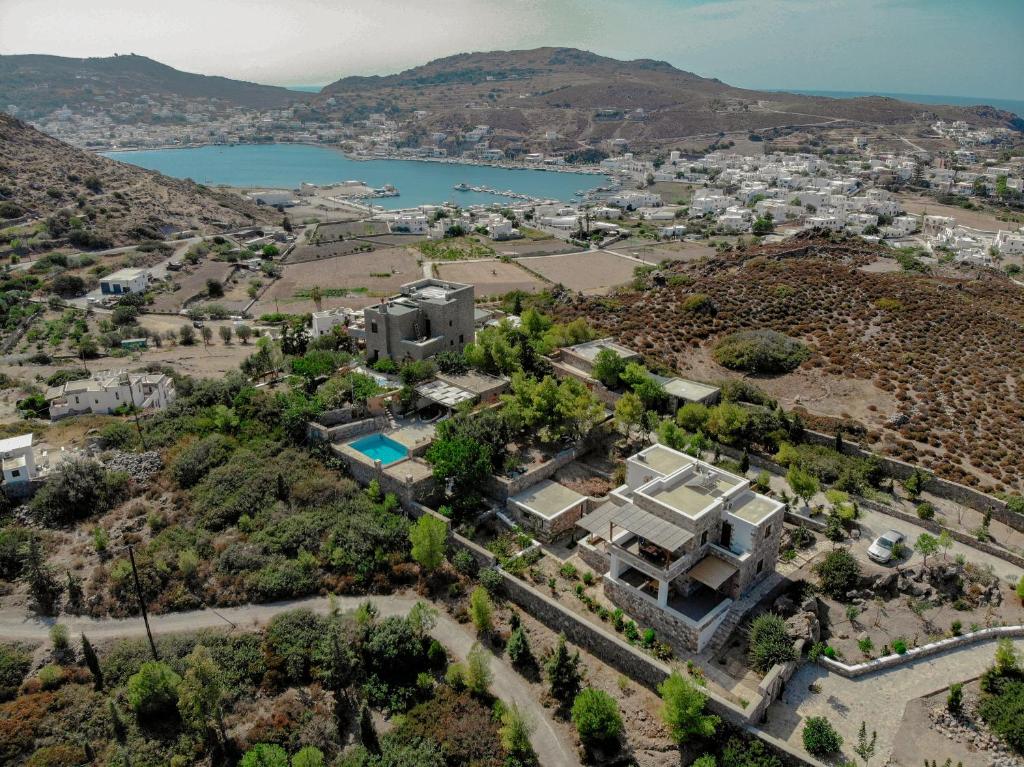 an aerial view of a villa with a lake at Blue Vista Patmos in Skala